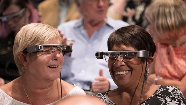 Smart caption glasses like these will be trailed from April. Credit James Bellorini