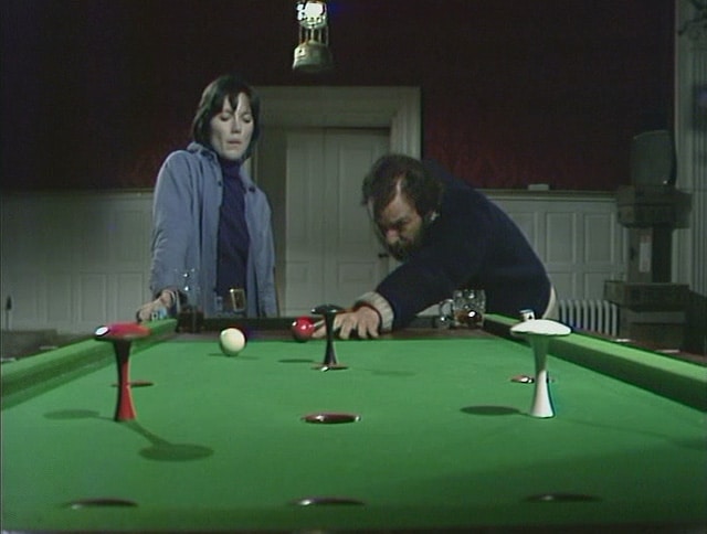 Bar billiards at the Tollbar with Jenny (Lucy Fleming) and Charles (Denis Lill) in The Enemy. Credit: BBC Worldwide.
